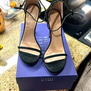 Stewart’s Weitzman caviar strap stilettos
